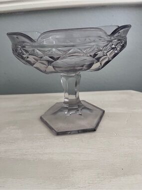 Elegant Glass Compote Pedestal Bowl in lite purple.